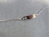 Plaat armbandje met klein zirkonia steentje wit 11 tot 13 cm