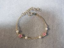 9 karaat gouden baby / kinder ambandje met pareltjes en roze bloem.