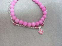 Setje van 2 zilveren kinderarmbandjes met roze bloem