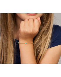 Gouden kinder armbandje met turquoise of bloedkoraal of onyx
